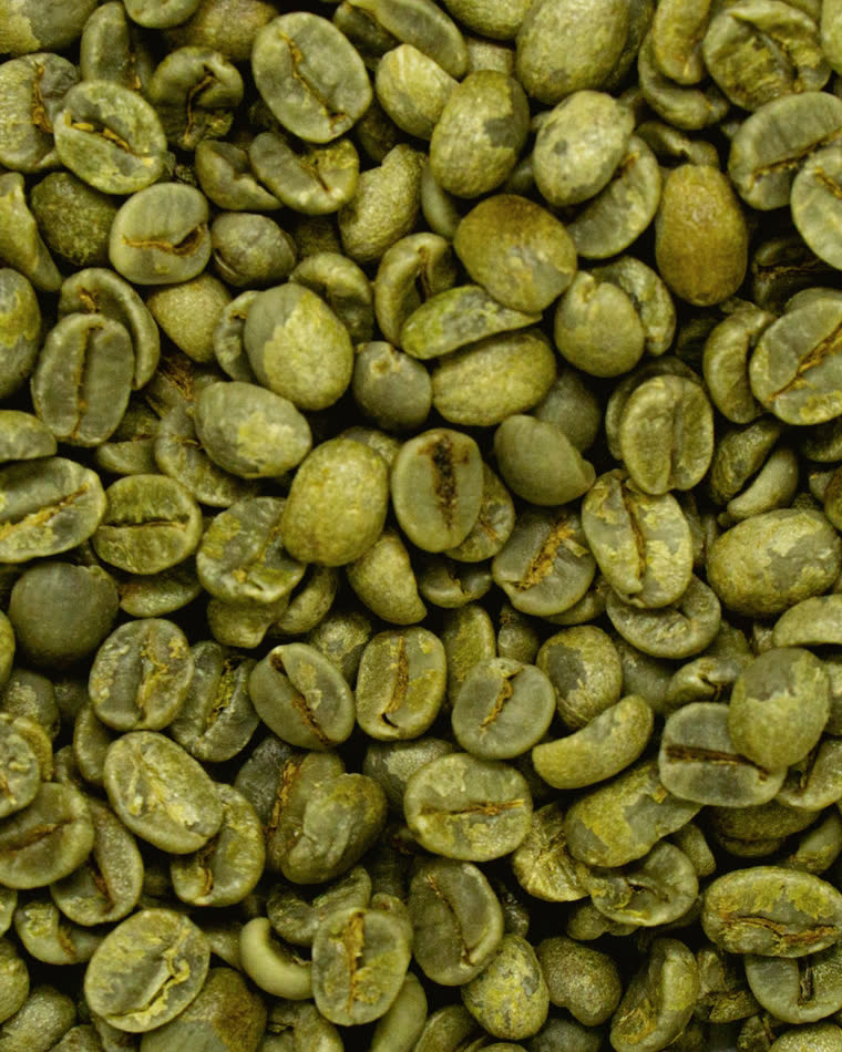 Loose green coffee beans.